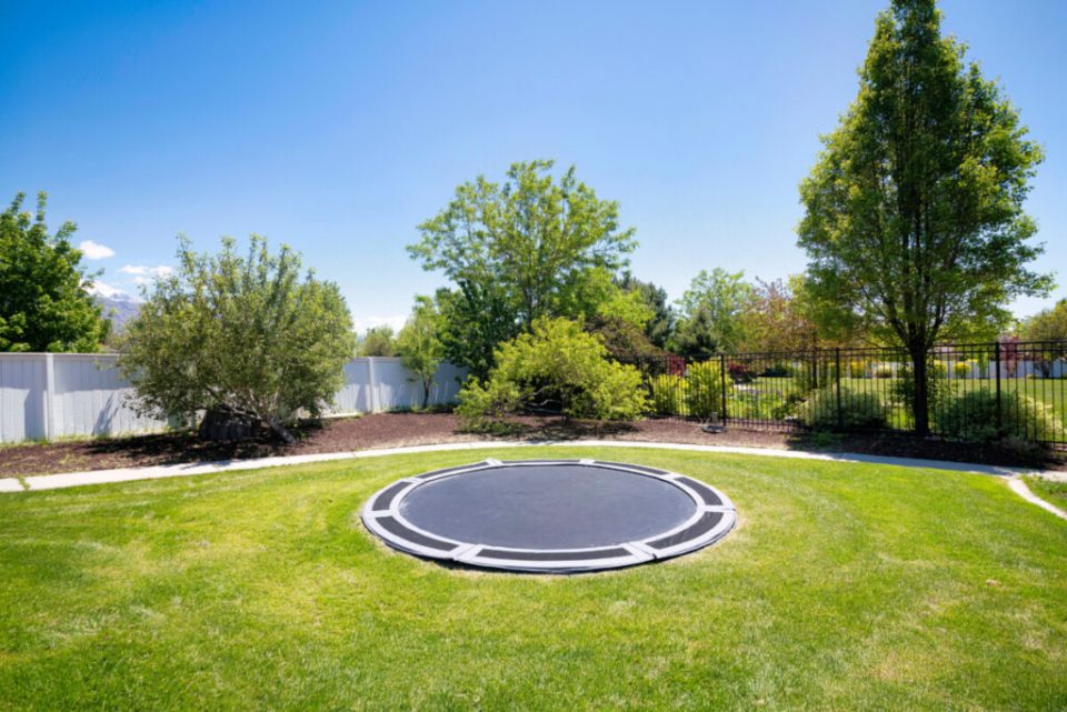 Can You Put a Trampoline On a Slope or Hill? Backyard Sidekick